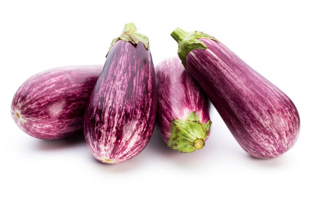 istock Fresh eggplants, aubergine on a white background. 870918824