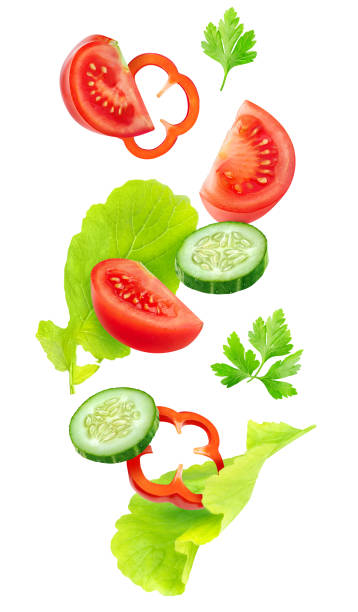 istock Isolated cut vegetables in the air 870919036