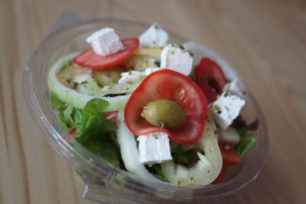 istock Greek salad prepared for to go 870919390