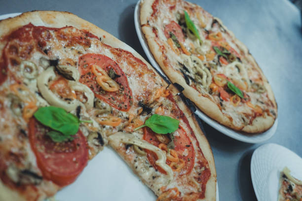 Two delicious vegetable pizzas