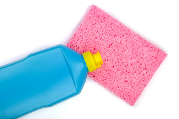 istock dishwashing detergent with cleaning sponge isolated on white background 870930936