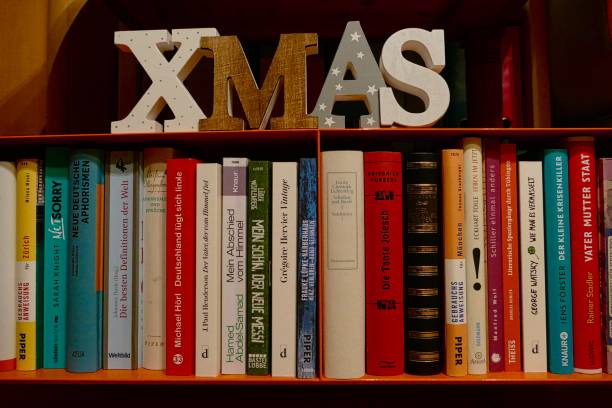 istock Xmas letters standing on an orange book shelf 870931404