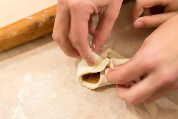 istock children's hands cook dough cookies 870935276