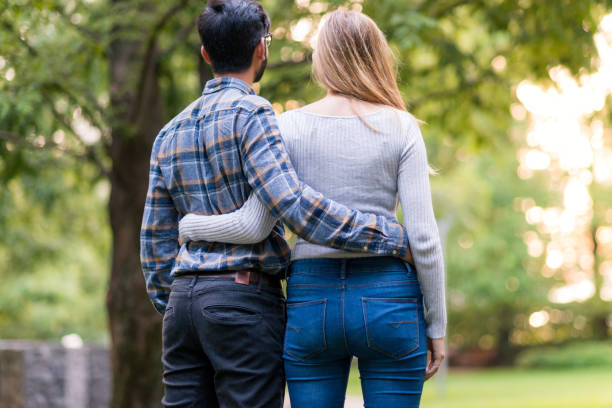 istock Couple in the park 870941184