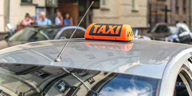 istock Checker taxi on city background. 870955106