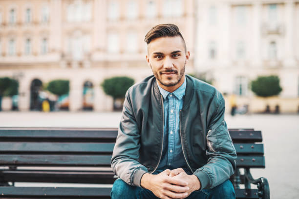 istock Focused person sitting on the bench and thinking about next steps 870958458