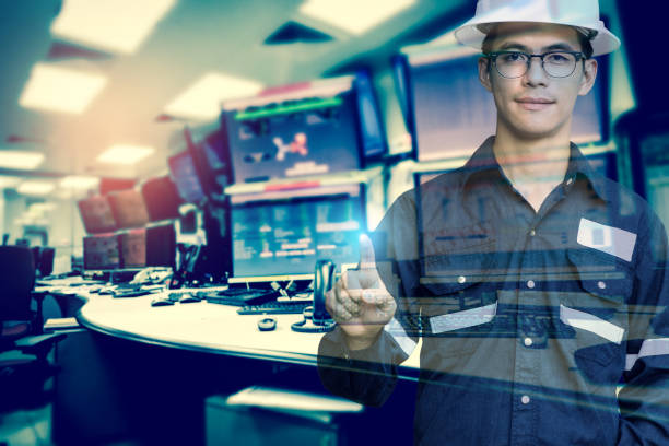 istock Double exposure of  Engineer or Technician man in working shirt press his finger for new innovation with group of computers room background, business and industry concept. 870968542