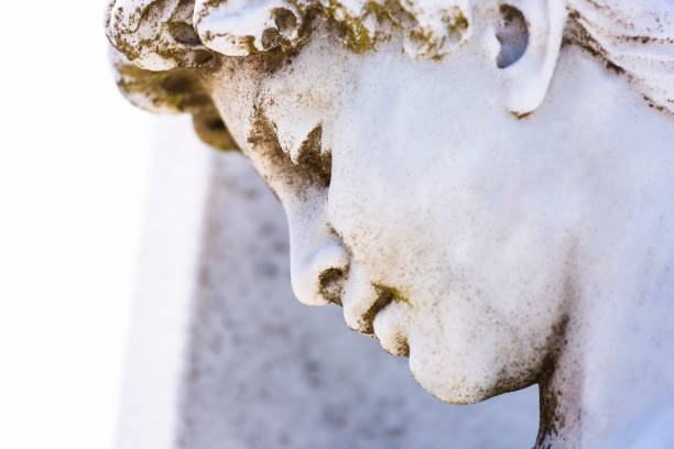 istock Face of angel, old marble statue, background with copy space 870971434