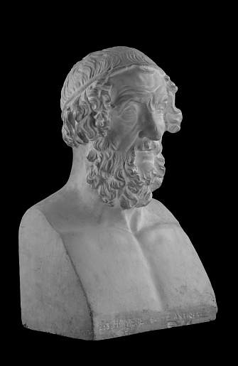 White plaster statue of the bust of the philosopher Homer.
