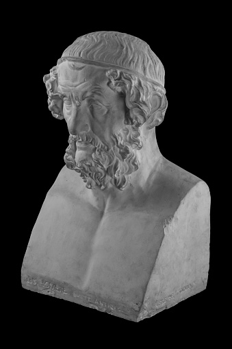 White plaster statue of the bust of the philosopher Homer.