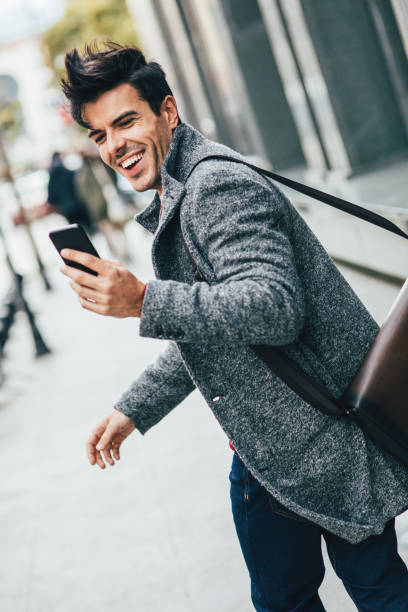 istock Man texting in the city 870996788