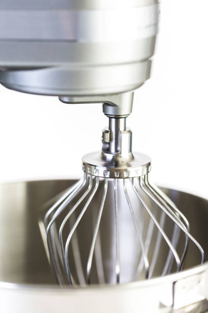Silver food electric mixer on a white background.