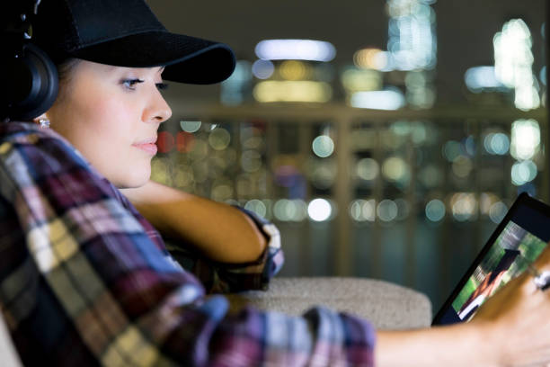 istock Beautiful Young Woman Using Digital Tablet at Home 871006396