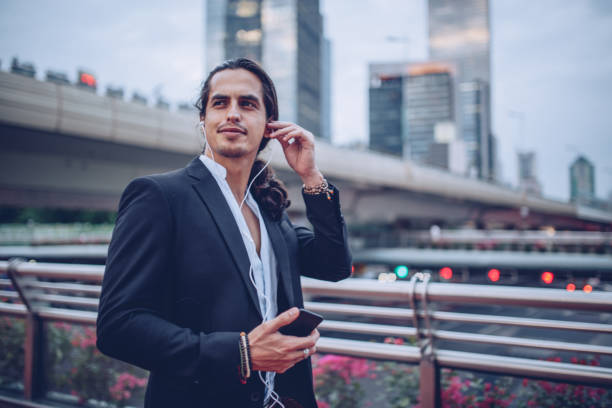 istock Gentleman enjoying in music 871009332