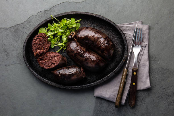Bloody sausages on cast iron plate Bloody sausages on cast iron plate. Top view weisswurst photos stock pictures, royalty-free photos & images