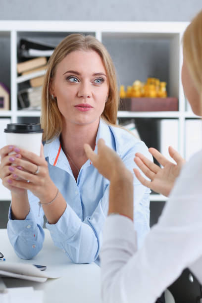 istock Smiling business woman drinking coffee 871012466