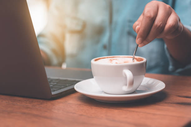istock Businessmen are making coffee and working with notebooks. 871012526