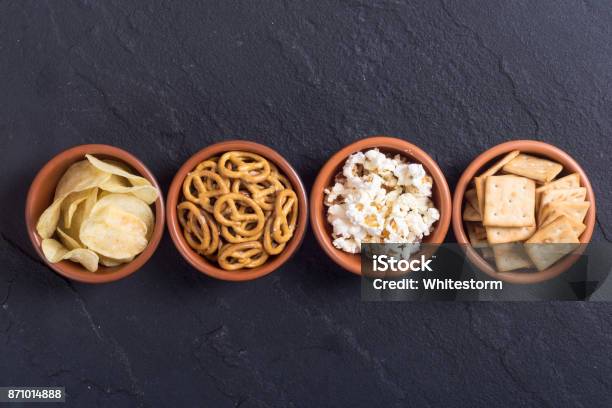 Mix Of Snacks Stock Photo - Download Image Now - Bowl, Snack, Pretzel