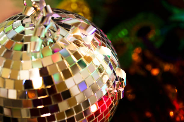 istock New Year's Eve disco ball, decorations, lights, tinsel. 871017938