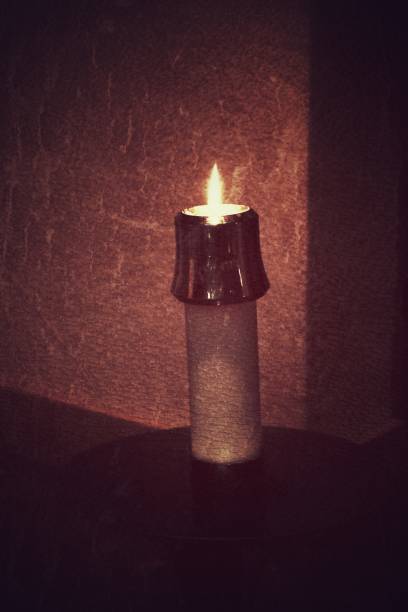 istock Rustic, Textured, Sepia, Candlelight, One Candle Burning 871022022