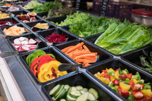 istock shelves of salad bar fresh vegetables 871024664