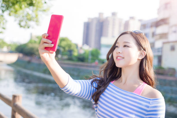 istock woman selfie happily 871031560