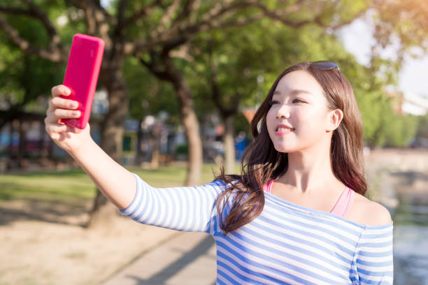 istock woman selfie happily 871031580