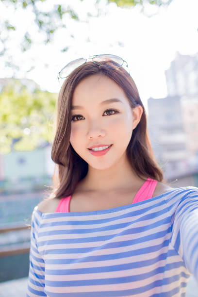 istock woman selfie happily 871033664