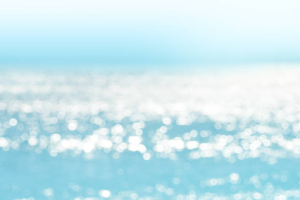 Blur tropical sea water bokeh background Blur tropical sea water bokeh background. Abstract sea water bokeh glittering sea stock pictures, royalty-free photos & images