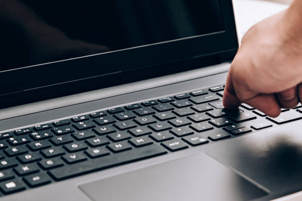 istock Pressing the Enter key on laptop 871053172