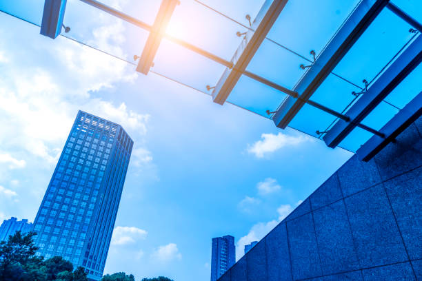 istock Low angle view of skyscrapers architectural glass 871056828