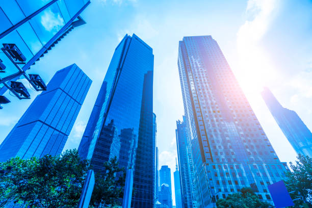 istock Low angle view of skyscrapers architectural glass 871056932