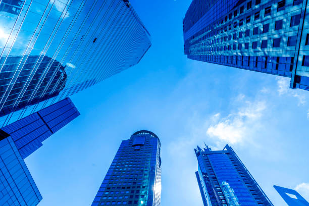 istock Low angle view of skyscrapers architectural glass 871060970