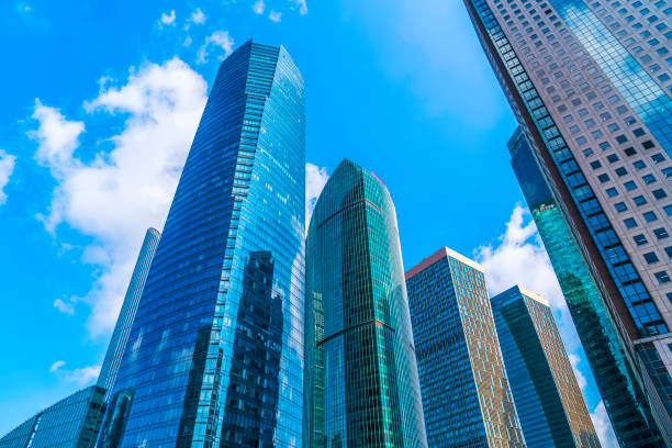 istock Low angle view of skyscrapers architectural glass 871061048