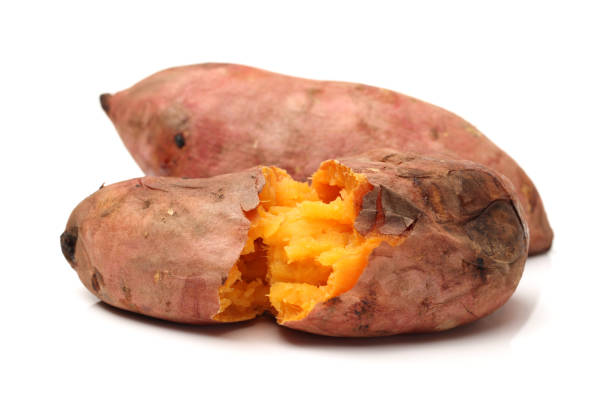 istock Roasted sweet potatoes  on white background 871071388