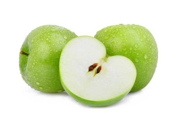 two whole and half of green apple or granny smith apple with drop of water isloated on white background two whole and half of green apple or granny smith apple with drop of water isloated on white background islotaed on white stock pictures, royalty-free photos & images