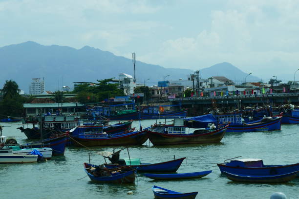 istock Blue boats in Nha Trang harbour 871078720