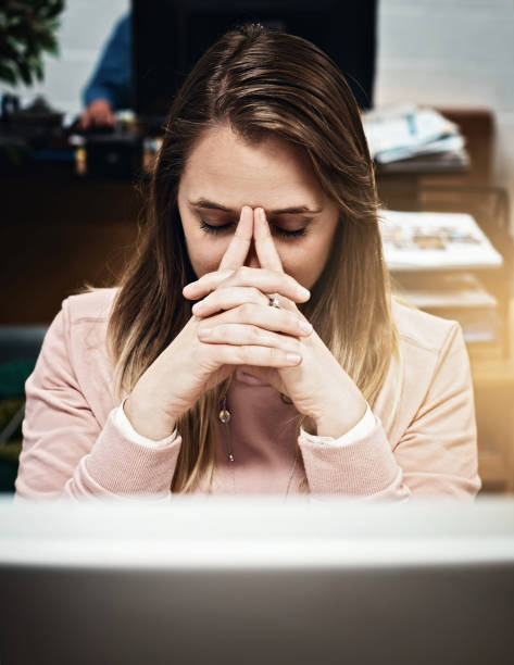 istock Tired woman office worker takes a moment 871078902