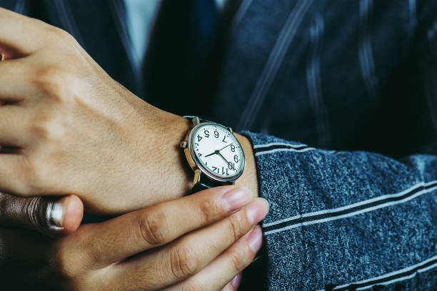 istock Male arm wearing a wrist watch 871082852