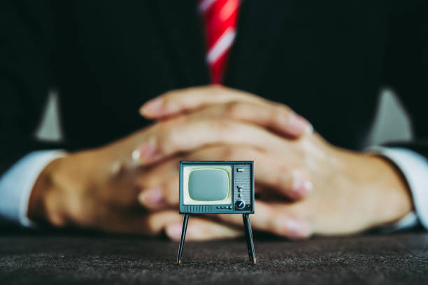 istock Television and businessman 871083262