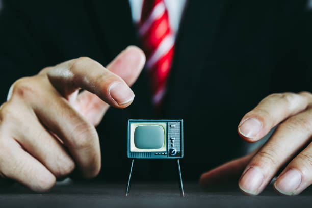 istock Television and businessman 871083310