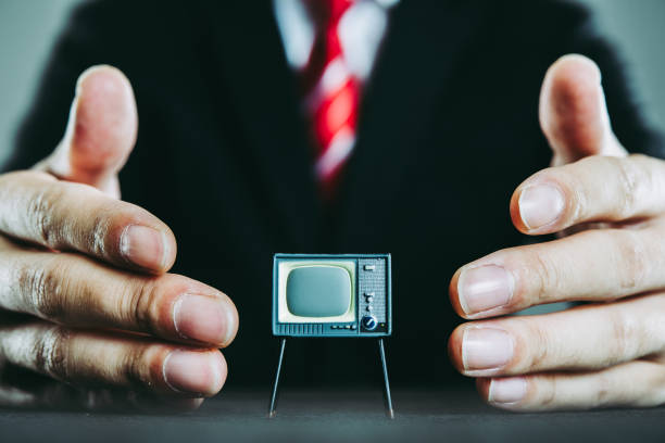 istock Television and businessman 871085430