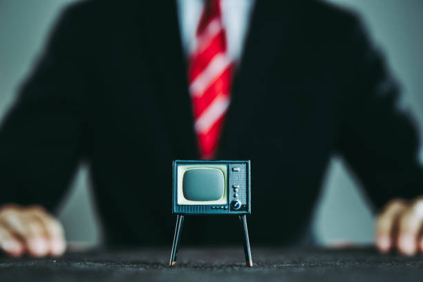 istock Television and businessman 871085478