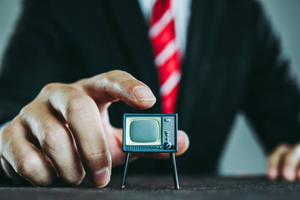 istock Television and businessman 871085534
