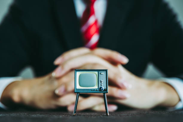 istock Television and businessman 871085726