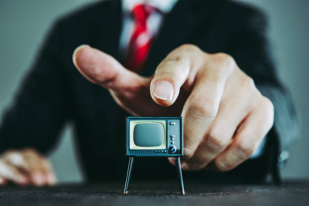 istock Television and businessman 871085766