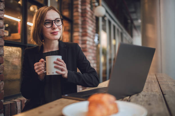 istock Woman working in the cafe 871085774