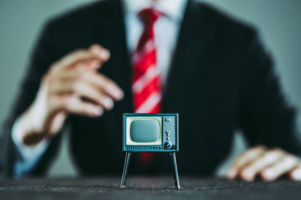 istock Television and businessman 871085798