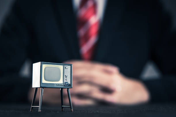istock Television and businessman 871085838