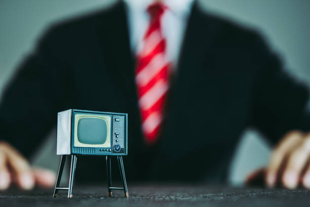 istock Television and businessman 871085876